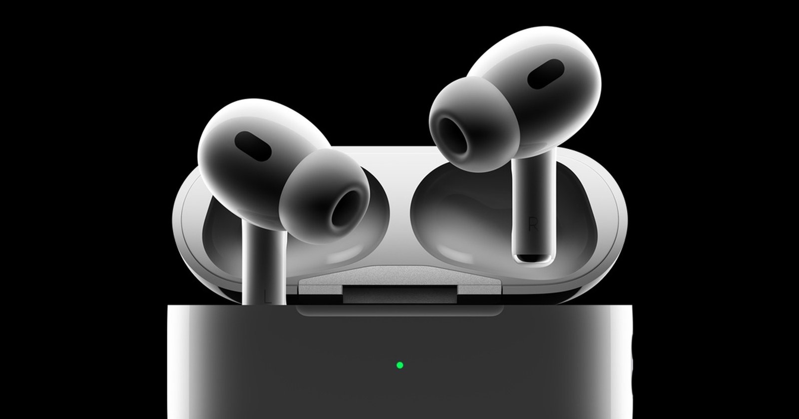AirPods Pro 2 on a tray table during flight